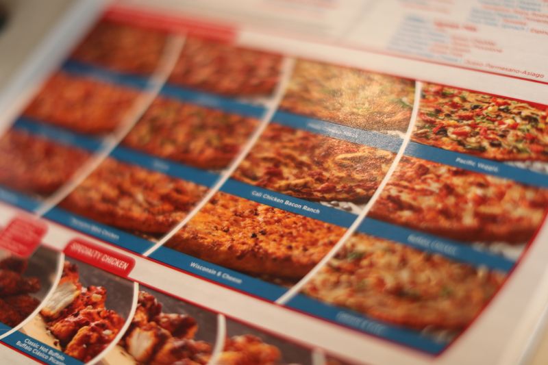 Berkshire bites into Domino's Pizza, dips into Pool amid stock retreat