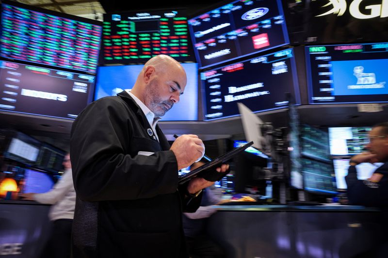 Stocks mixed, gold retreats from record as investors weigh Trump tariff threats